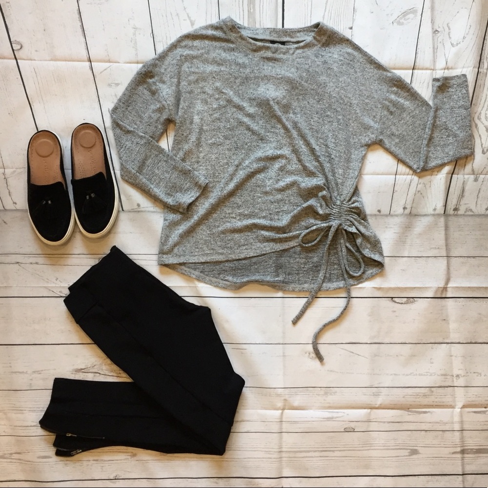 Soft gray sweater with tie detail